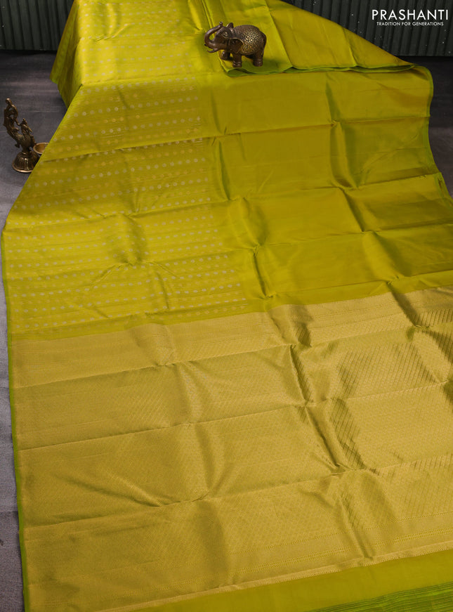 Pure kanchipuram silk saree lime green with half & half style and long zari woven border