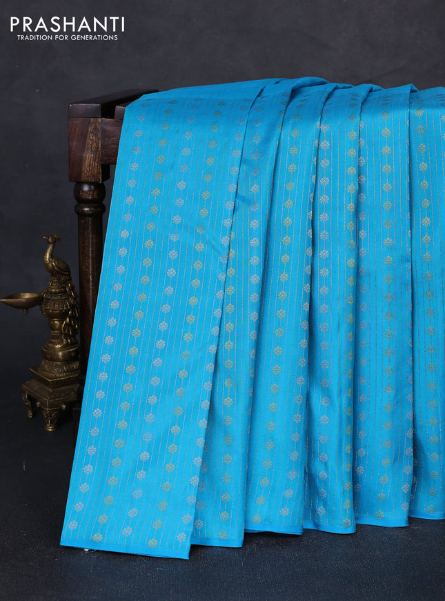 Pure kanchipuram silk saree light blue with half & half style and long zari woven border