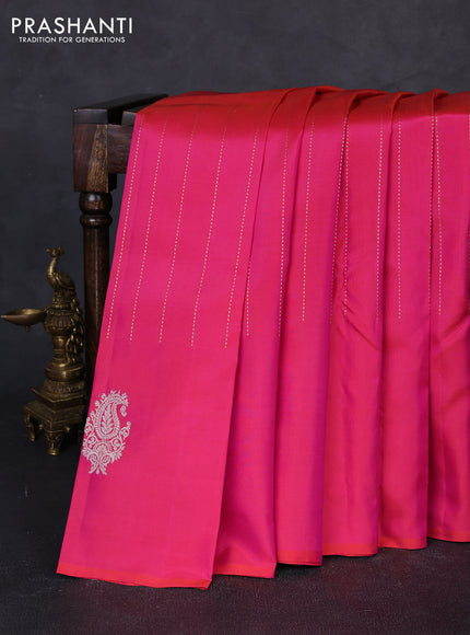 Pure kanchipuram silk saree dual shade of pinkish orange and green with allover zari weaves and silver & gold zari woven butta border