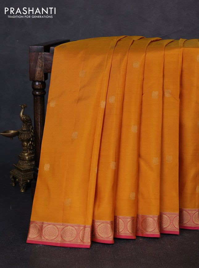 Pure kanchipuram silk saree mustard yellow and pink with zari woven annam buttas and rudhraksha zari woven border