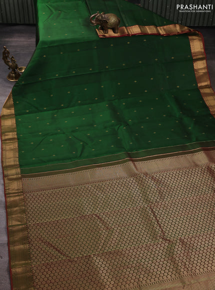 Pure kanchipuram silk saree bottle green and dual shade of greenish red with zari woven buttas and zari woven border