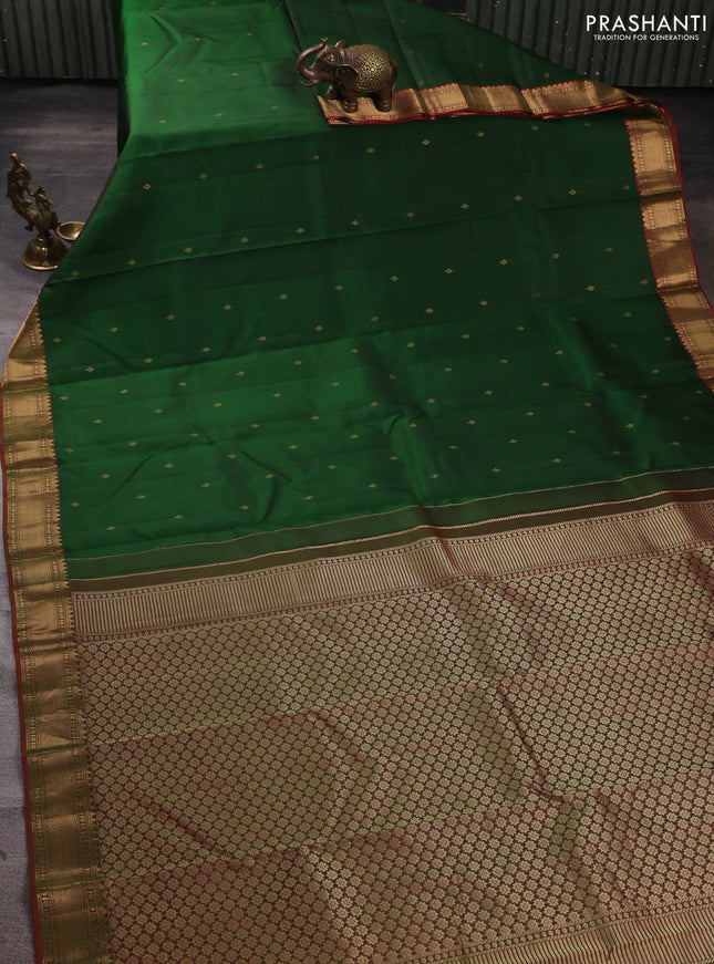 Pure kanchipuram silk saree bottle green and dual shade of greenish red with zari woven buttas and zari woven border