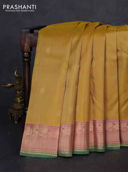Pure kanchipuram silk saree mustard shade and pink with zari woven annam buttas and annam zari woven border
