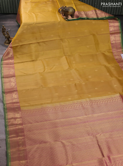 Pure kanchipuram silk saree mustard shade and pink with zari woven annam buttas and annam zari woven border