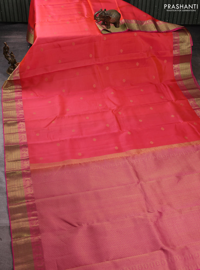 Pure kanchipuram silk saree dual shade of peach pink and pink with zari woven buttas and rich zari woven border