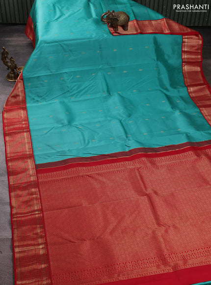 Pure kanchipuram silk saree teal green shade and red with zari woven buttas and zari woven korvai border