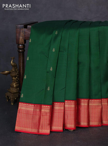 Pure kanchipuram silk saree bottle green and red with zari woven buttas and zari woven korvai border
