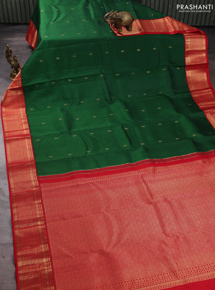 Pure kanchipuram silk saree bottle green and red with zari woven buttas and zari woven korvai border