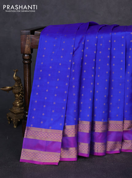 Pure kanchipuram silk saree blue and purple with allover zari woven buttas and rettapet zari woven border