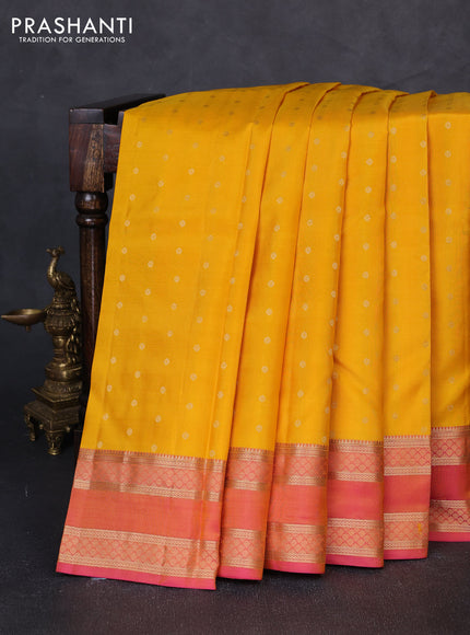 Pure kanchipuram silk saree yellow and dual shade of pink with allover zari woven buttas and rettapet zari woven border