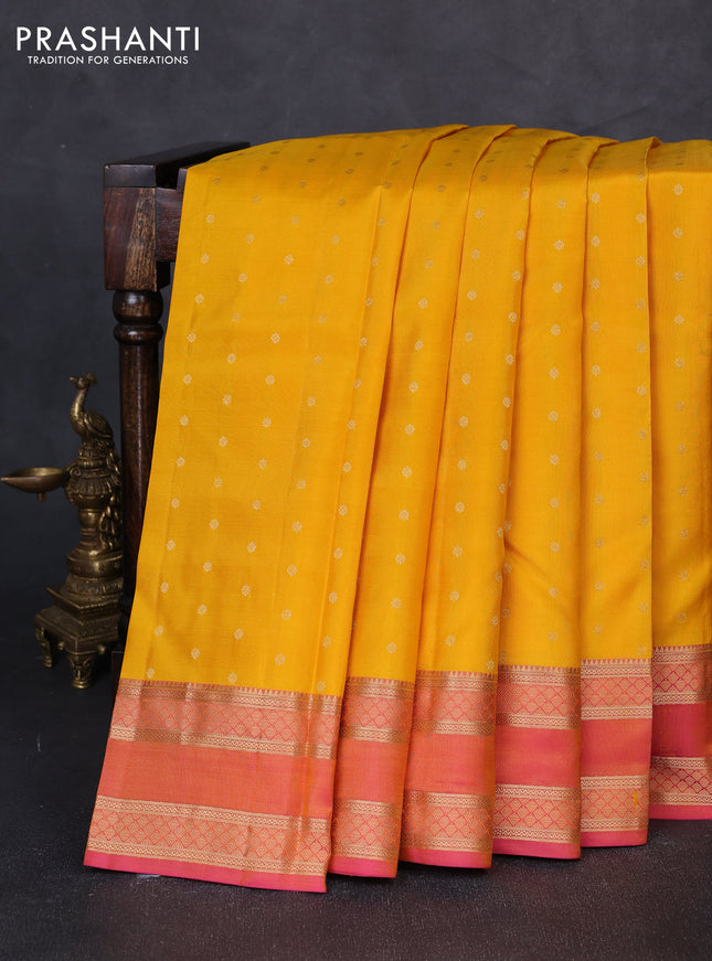 Pure kanchipuram silk saree yellow and dual shade of pink with allover zari woven buttas and rettapet zari woven border