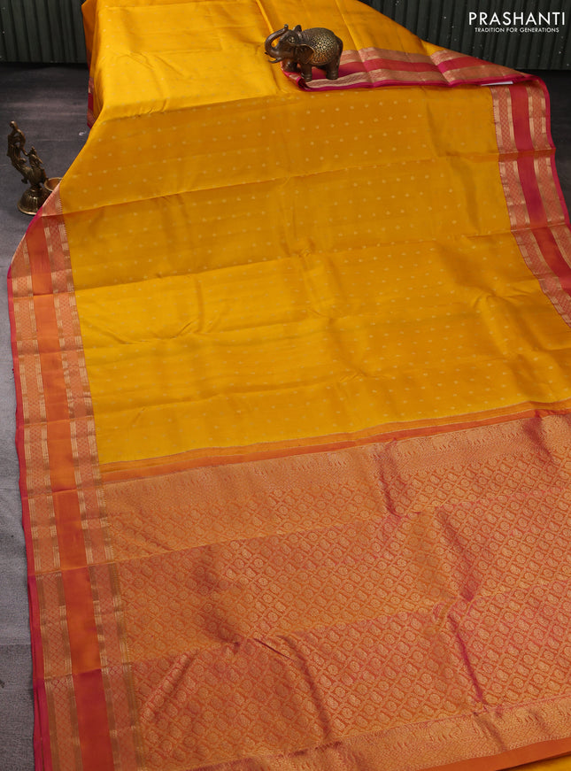 Pure kanchipuram silk saree yellow and dual shade of pink with allover zari woven buttas and rettapet zari woven border