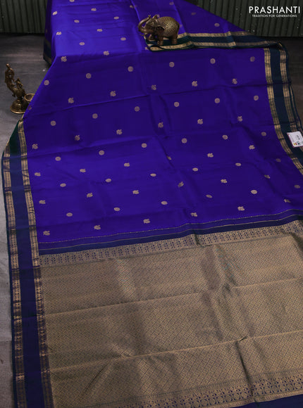 Pure kanchipuram silk saree blue and dual shade of green with zari woven annam & rudhraksha buttas and rettapet zari woven border