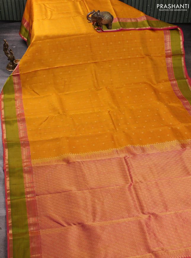 Pure kanchipuram silk saree mustard yellow and pink green with allover checks & zari buttas and rettapet zari woven border