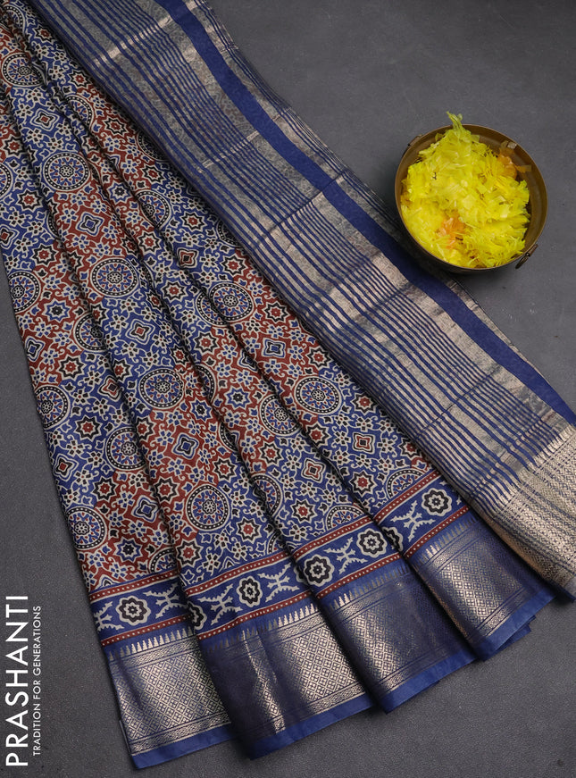 Assam silk saree dark mustard and indigo blue with allover ajrakh prints and zari woven border