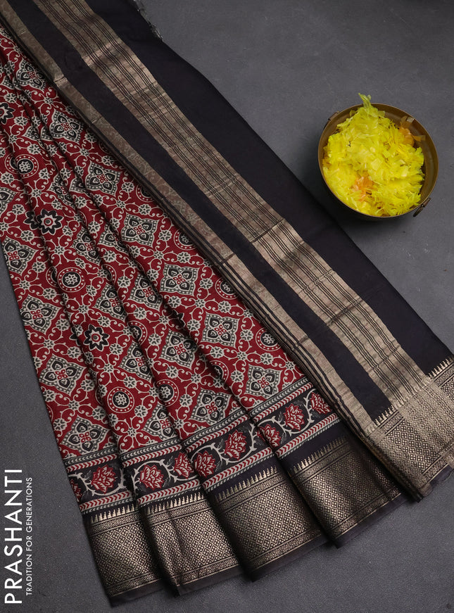 Assam silk saree maroon and black with allover ajrakh prints and zari woven border