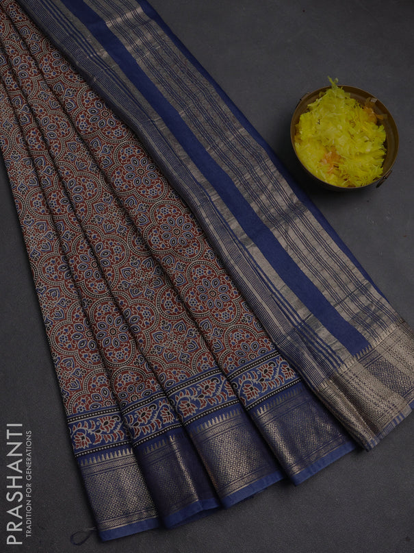 Assam silk saree dark mustard and indigo blue with allover ajrakh prints and zari woven border