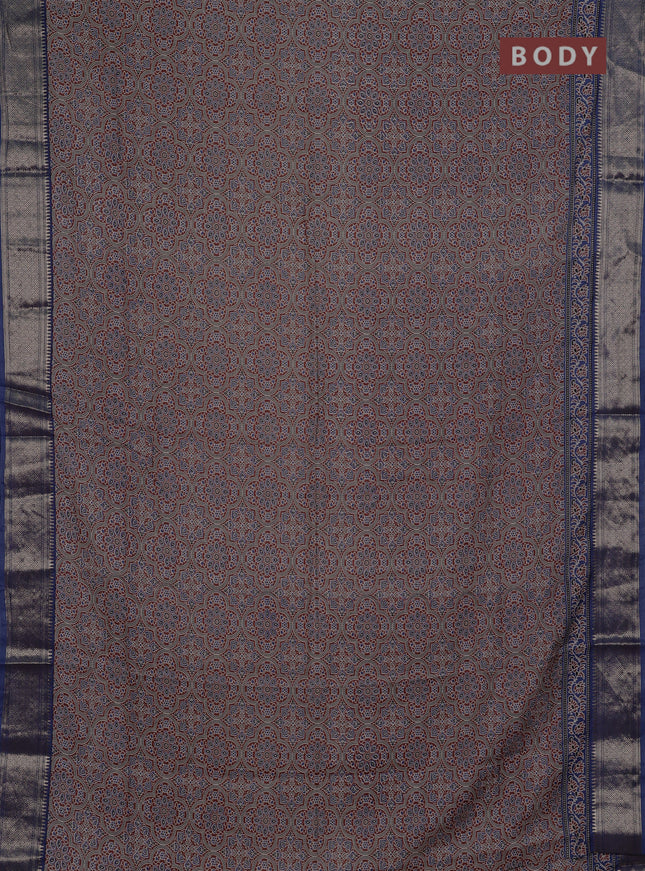 Assam silk saree dark mustard and indigo blue with allover ajrakh prints and zari woven border