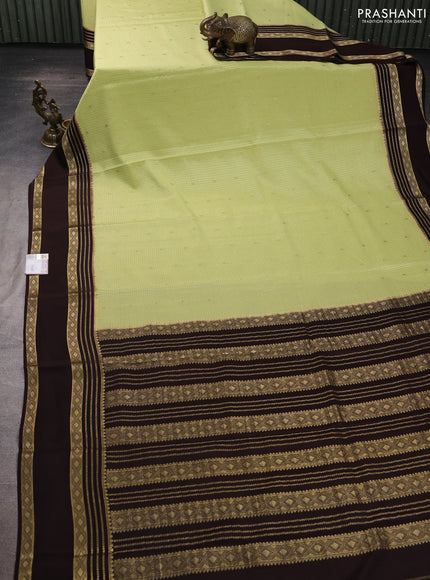 Pure mysore silk saree pista green and coffee brown with allover small zari checks & buttas and rettapet zari woven border