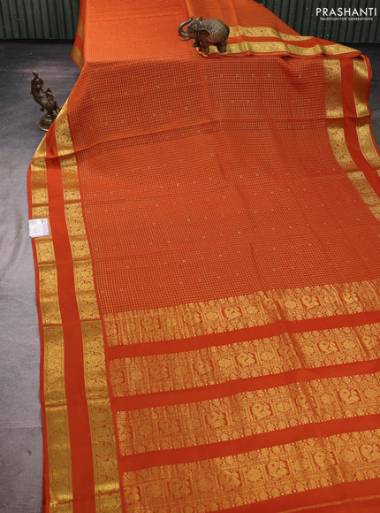 Pure mysore silk saree rustic orange with allover small zari checks & buttas and rettapet zari woven border