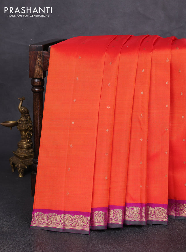 Pure kanchipuram silk saree orange and purple with zari woven buttas and paisley zari woven korvai border