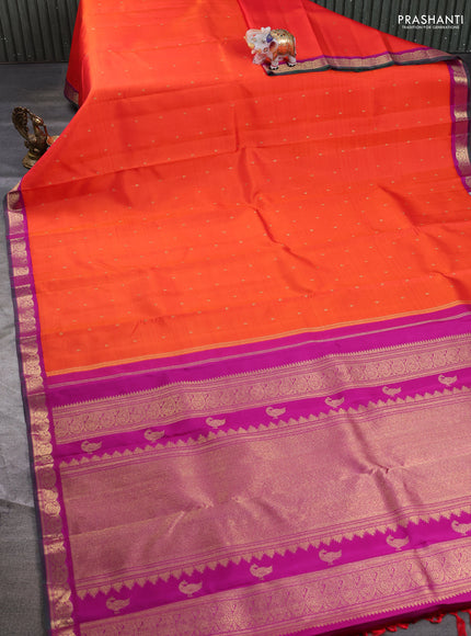 Pure kanchipuram silk saree orange and purple with zari woven buttas and paisley zari woven korvai border