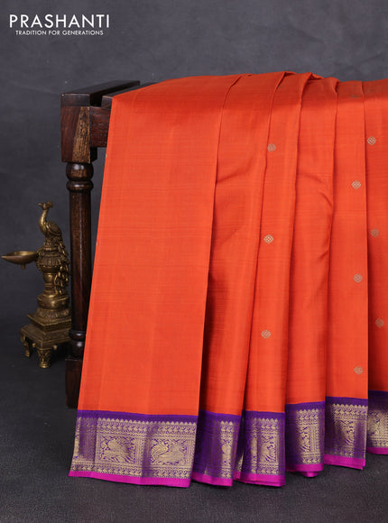 Pure kanchipuram silk saree orange and purple with zari woven buttas and zari woven korvai border
