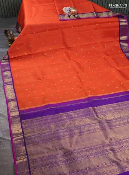 Pure kanchipuram silk saree orange and purple with zari woven buttas and zari woven korvai border