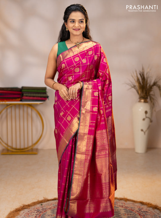Pure kanchipuram silk saree magenta pink with allover zari checks & buttas and rich zari woven border