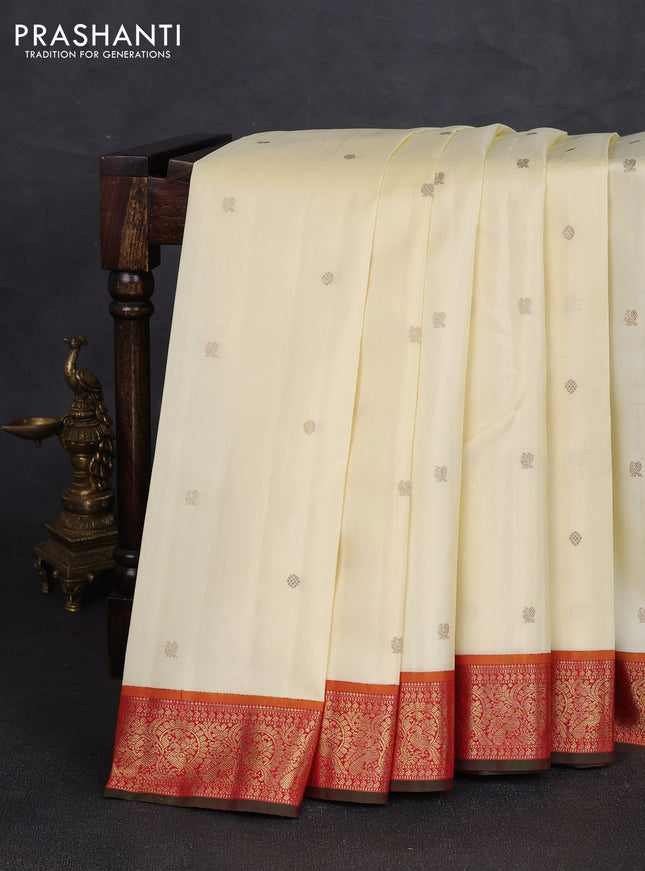 Pure kanchipuram silk saree cream and red with zari woven buttas and zari woven korvai border