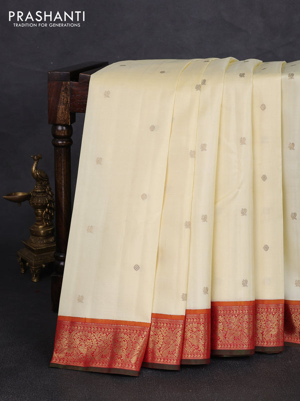 Pure kanchipuram silk saree cream and red with zari woven buttas and zari woven korvai border