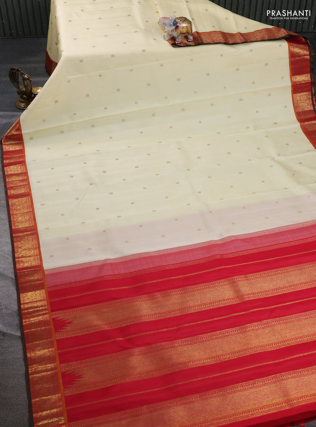 Pure kanchipuram silk saree cream and red with zari woven buttas and zari woven korvai border