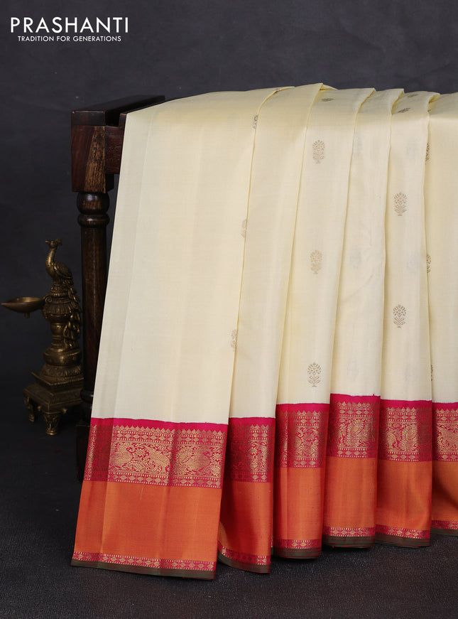 Pure kanchipuram silk saree cream and pink with zari woven buttas and rettapet zari woven korvai border