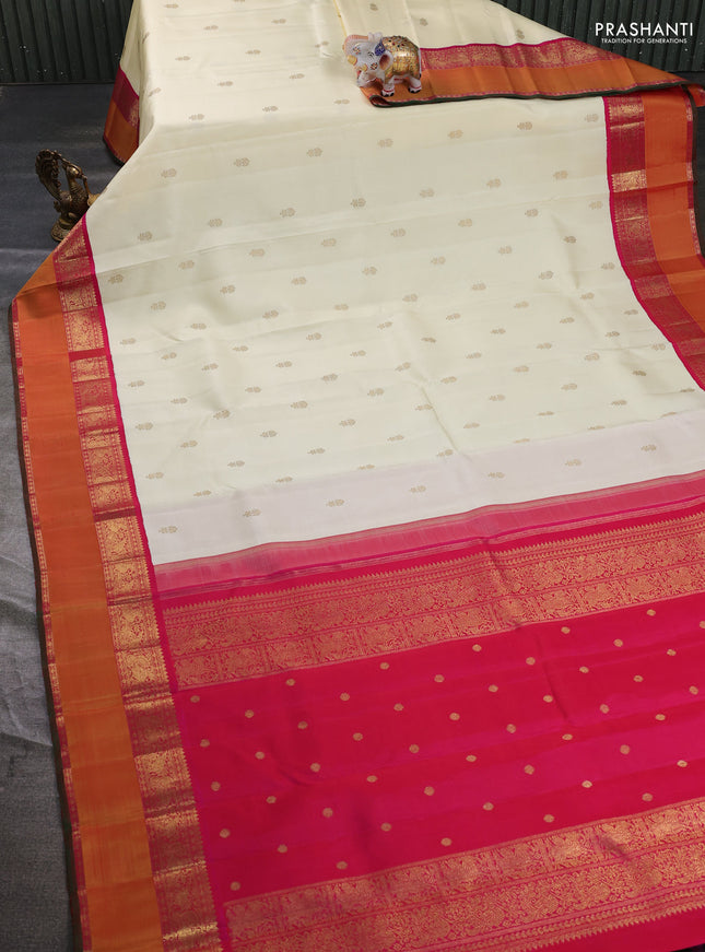 Pure kanchipuram silk saree cream and pink with zari woven buttas and rettapet zari woven korvai border