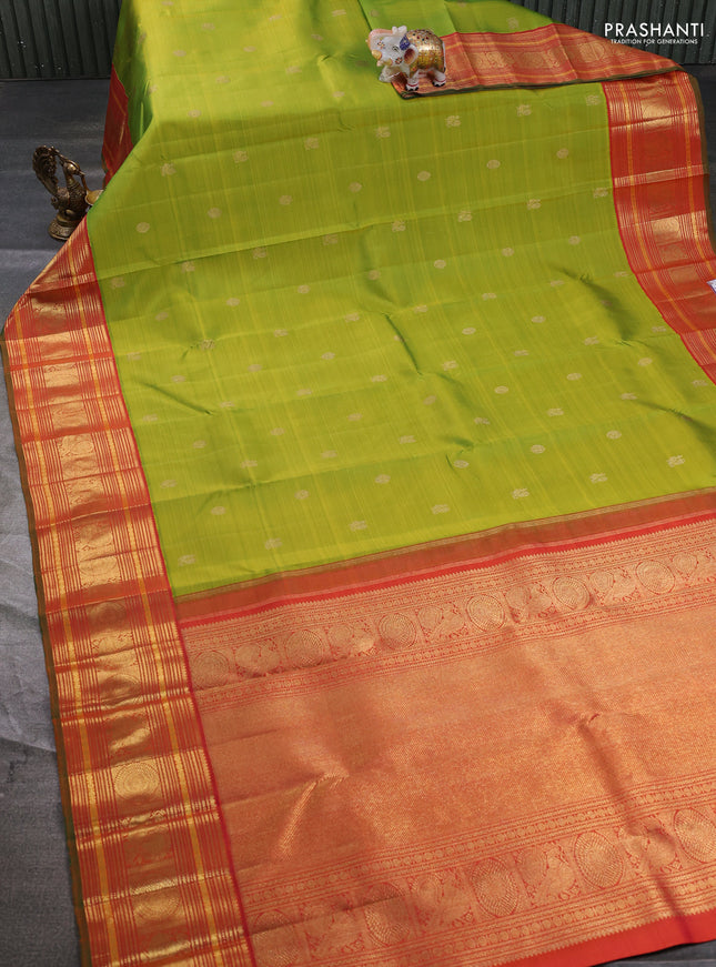 Pure kanchipuram silk saree light green and orange with annam & rudhraksha zari woven buttas and long zari woven korvai border