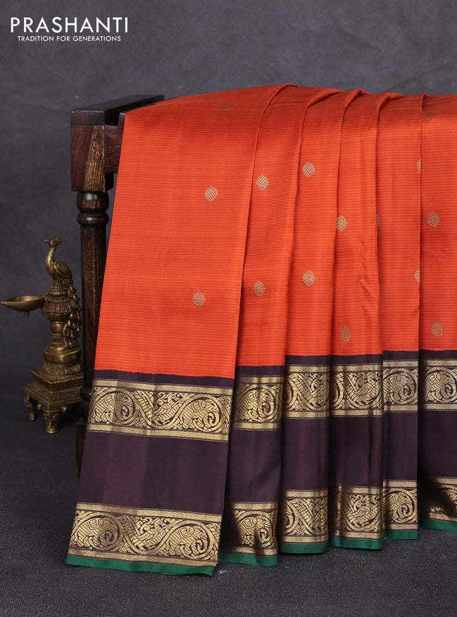 Pure kanchipuram silk saree orange and coffee brown with allover stripe pattern & zari buttas and long rettapet zari woven border