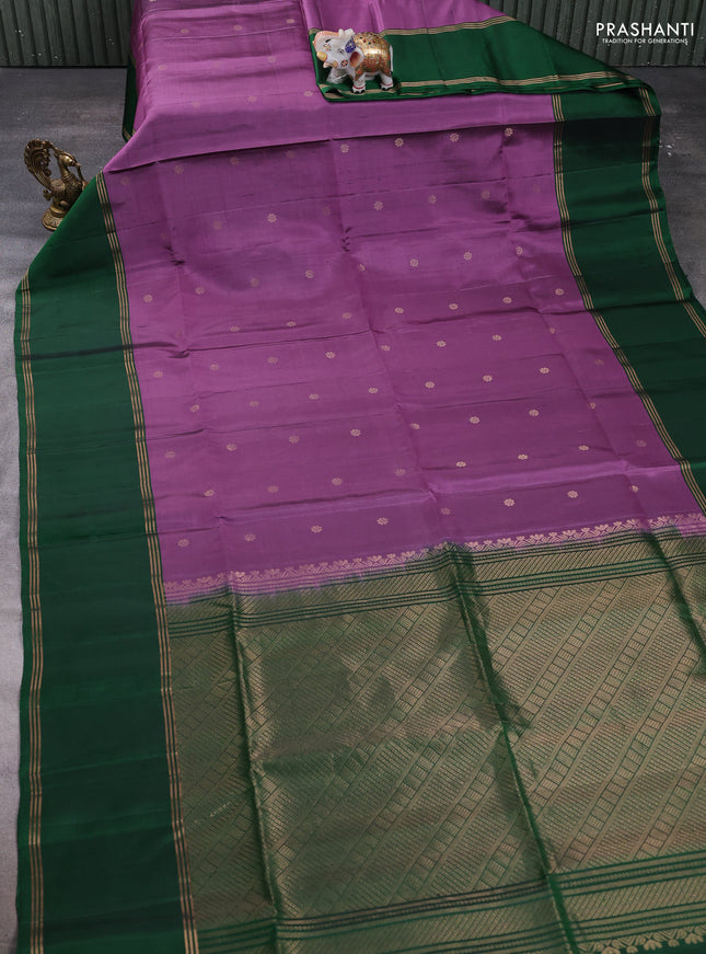 Pure soft silk saree purple and bottle green with zari woven buttas and rettapet zari woven border