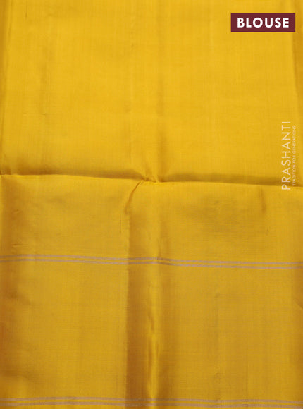 Pure soft silk saree beige and yellow with allover zari woven buttas and rettapet zari woven border