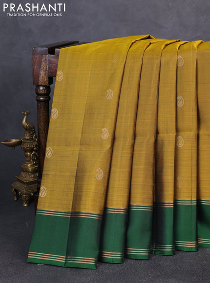 Pure soft silk saree mustard green and green with allover zari woven buttas and rettapet zari woven border