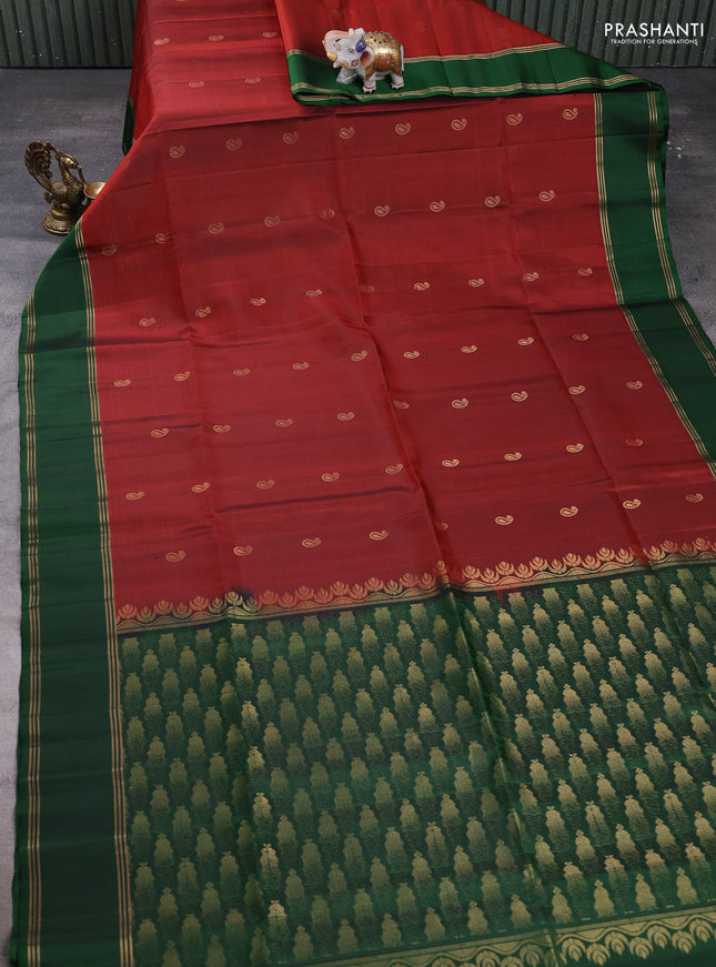 Pure soft silk saree rustic orange and green with allover zari woven buttas and rettapet zari woven border