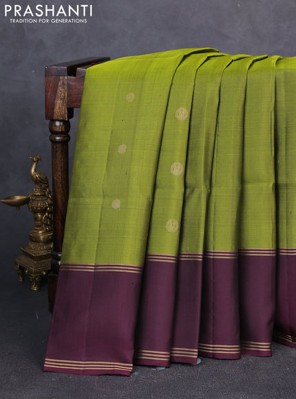 Pure soft silk saree mehendi green and deep wine with allover zari woven buttas and rettapet zari woven border