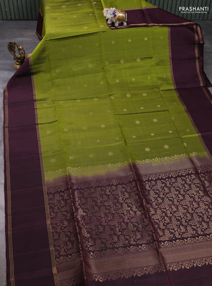 Pure soft silk saree mehendi green and deep wine with allover zari woven buttas and rettapet zari woven border