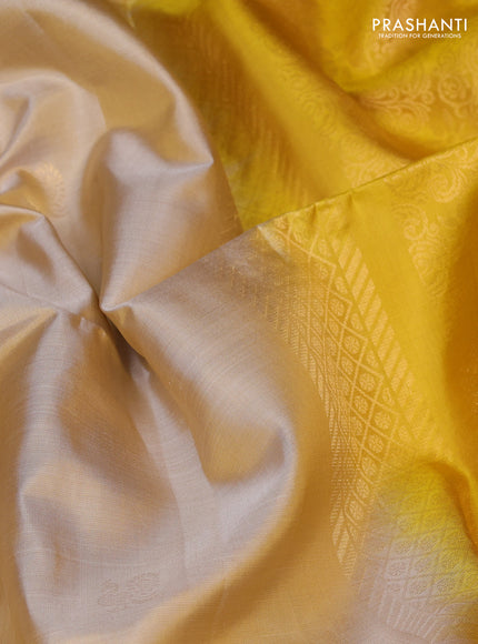 Pure soft silk saree beige and yellow with zari woven buttas and zari woven butta border