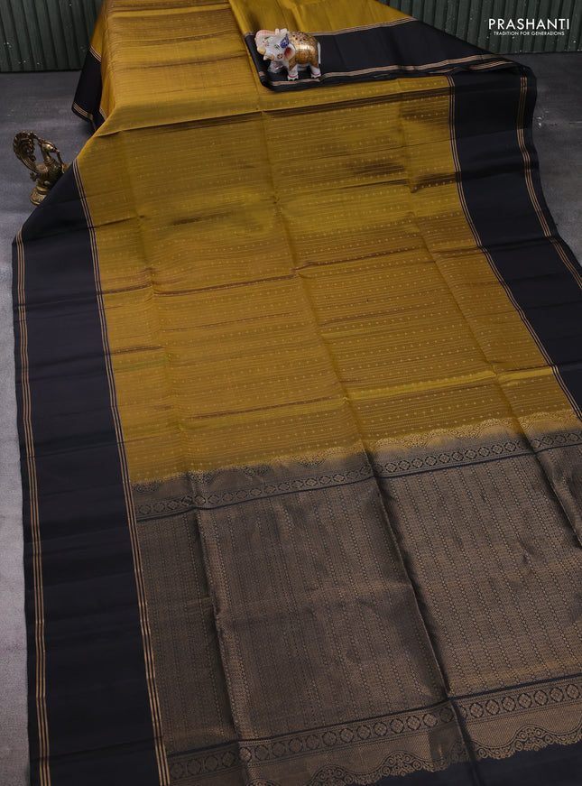 Pure soft silk saree mustard green and black with allover zari weaves  and rettapet zari woven border
