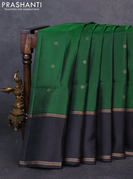 Pure soft silk saree green and black with zari woven buttas and rettapet zari woven border