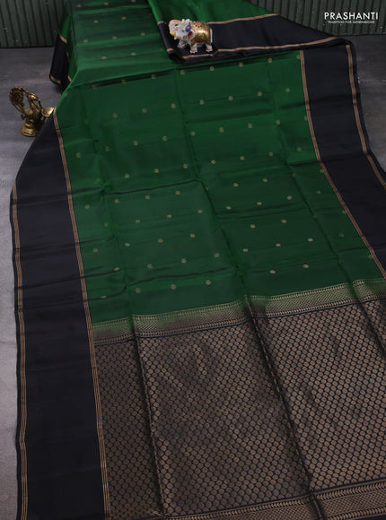 Pure soft silk saree green and black with zari woven buttas and rettapet zari woven border