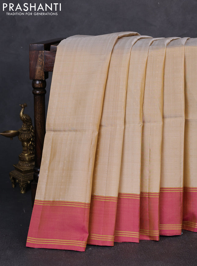 Pure soft silk saree beige and pink with allover zari weaves  and rettapet zari woven border