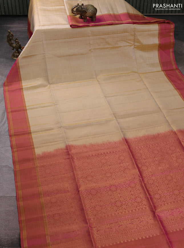 Pure soft silk saree beige and pink with allover zari weaves  and rettapet zari woven border