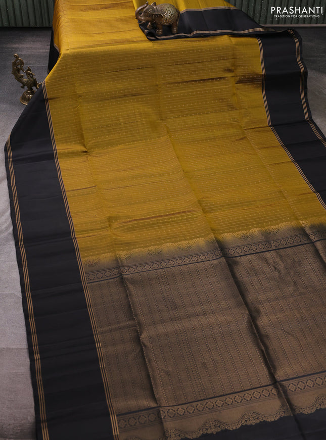 Pure soft silk saree mustard green and black with allover zari weaves  and rettapet zari woven border