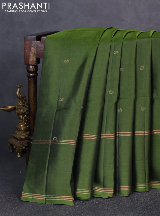 Pure soft silk saree mehendi green with zari woven buttas and rettapet zari woven border